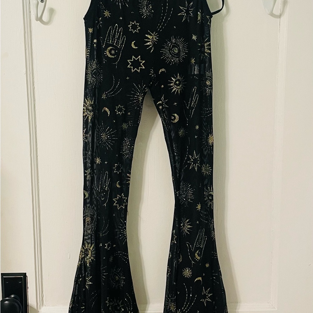 Dolls Kill Black and Gold Cosmic Sheer Bellbottoms